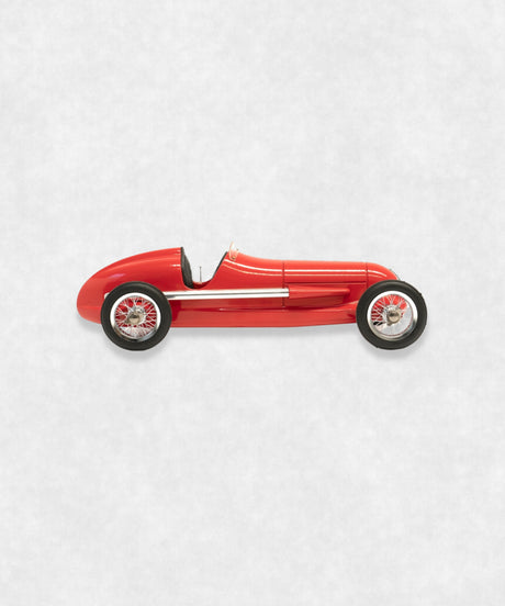 Vintage racing silberfeil car model inspired by classic Grand Prix racers and Silver Arrow legends, featuring a red race car body with a striking black seat. A collectible car model for motorsport and classic car enthusiasts. Viewed from the right side.