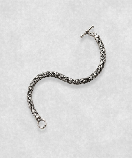 The Braid sterling silver bracelet open in S shape – handcrafted 925 silver braided chain with toggle clasp