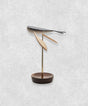 Side view of Flying Whale by Lee Sang-yong – kinetic art sculpture capturing a whale in a graceful floating and balancing form