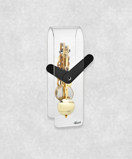 Mechanical skeleton clock with gold movement and pendulum – transparent acrylic case with black clock faces