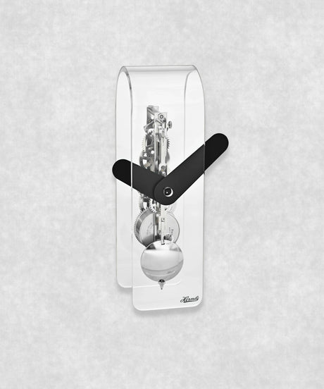 Mechanical skeleton clock with stainless steel movement and pendulum – transparent acrylic case with black clock faces