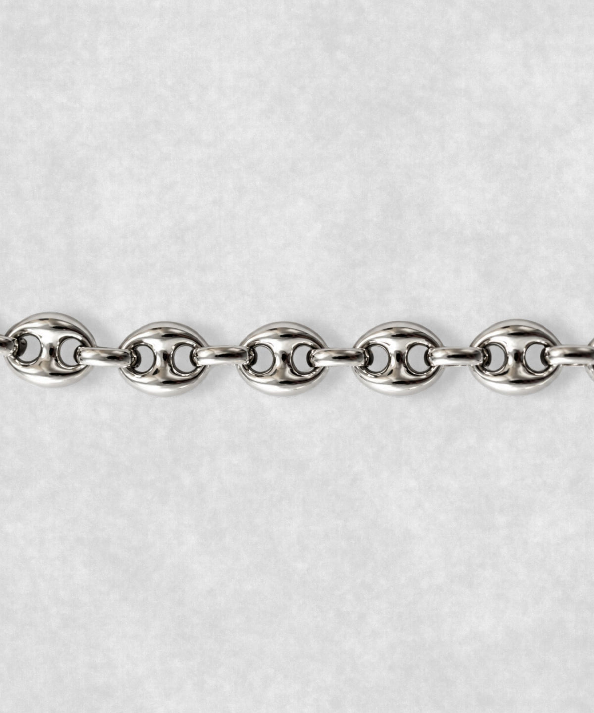 Close-up of 925 sterling silver coffee bean bracelet – detailed polished coffee bean links and sculptural finish