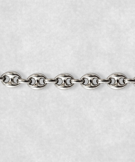 Close-up of 925 sterling silver coffee bean bracelet – detailed polished coffee bean links and sculptural finish