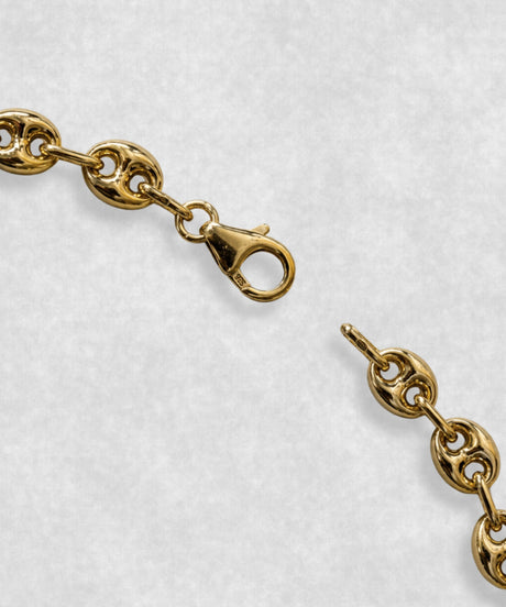 Close-up of gold coffee bean bracelet clasp – polished coffee bean links and detailed fastening mechanism