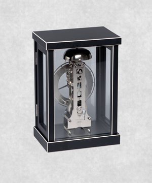 Back view of 14-day mechanical clock with black-painted natural wood frame – exposed movement, pendulum and hourly bell chime